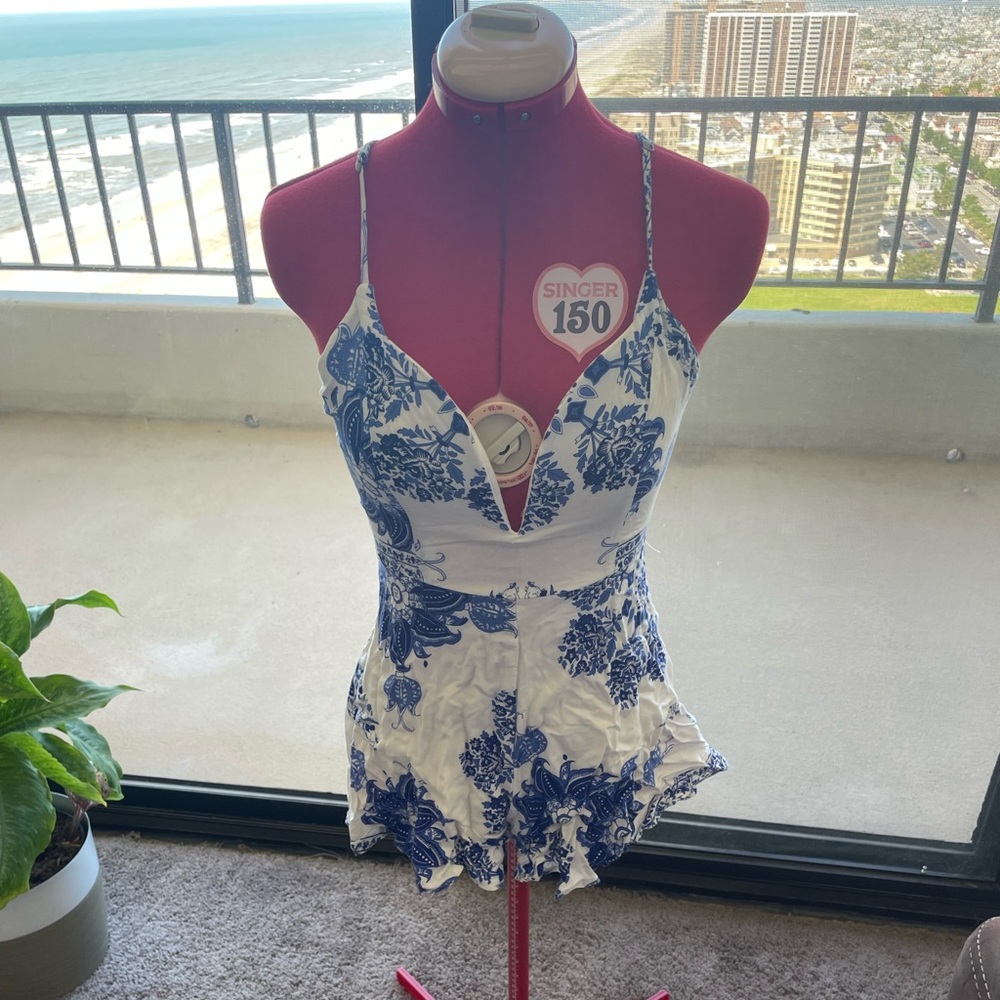 Adorable blue and white floral romper
